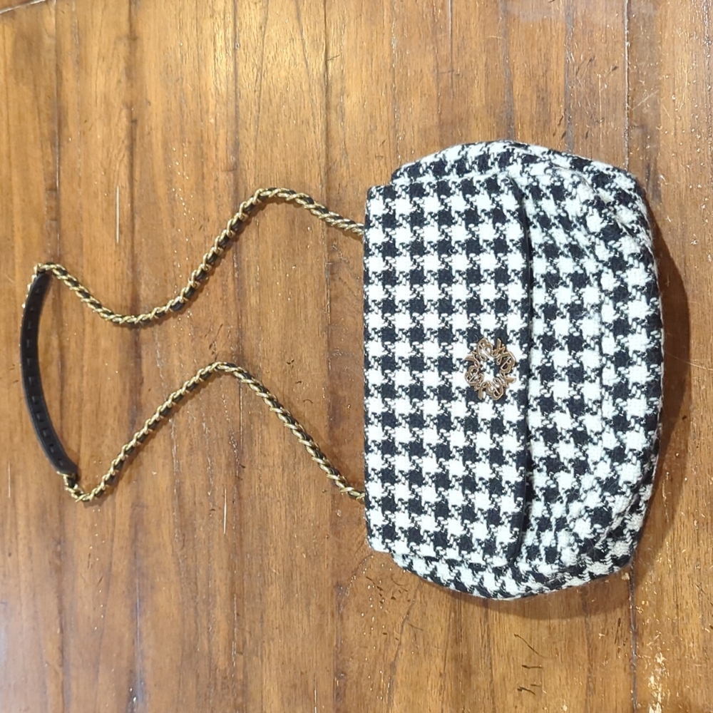White House Black Market purse black and white in color